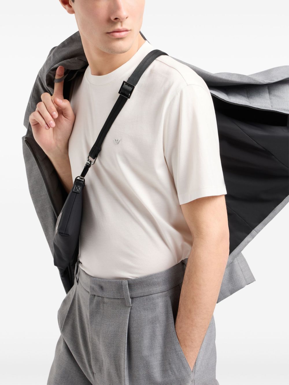 Front view with bag zipped and handles upright.