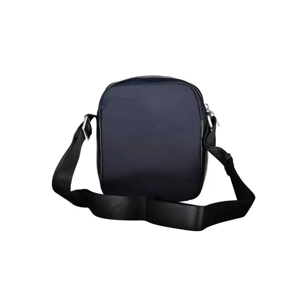 Front view with bag zipped and handles upright.