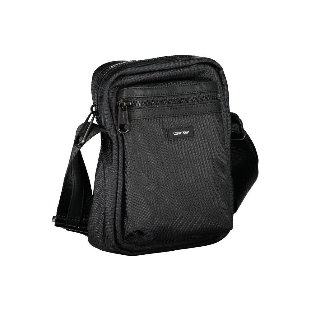 Front view with bag zipped and handles upright.