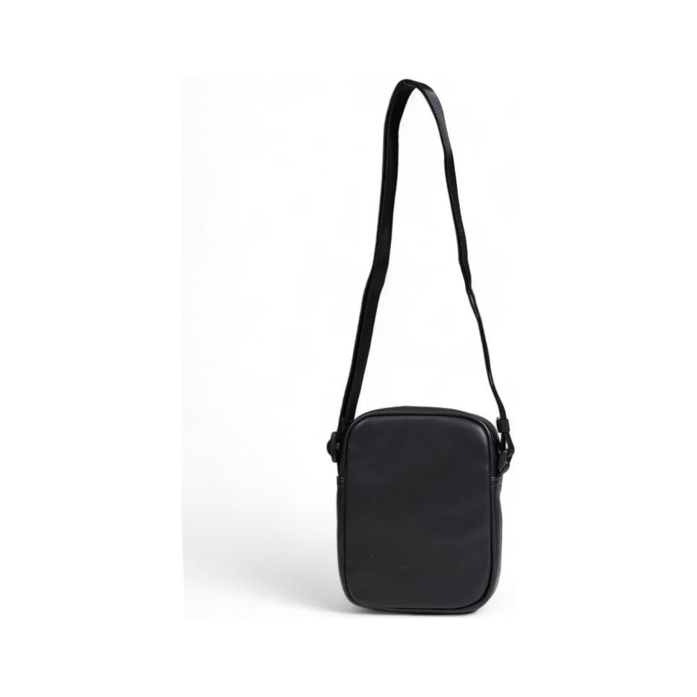 Front view with bag zipped and handles upright.