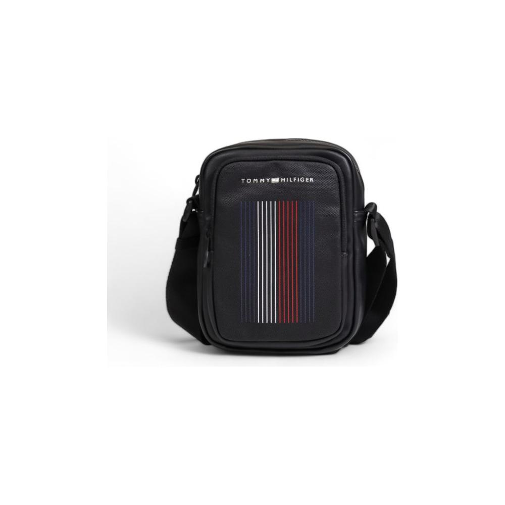 Front view with bag zipped and handles upright.